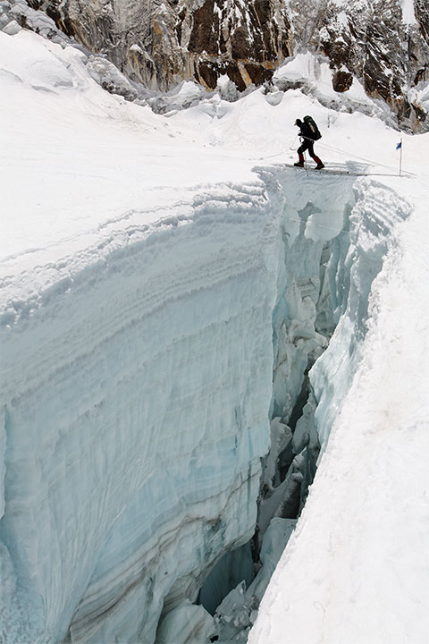 Andy crosses a large crevasse